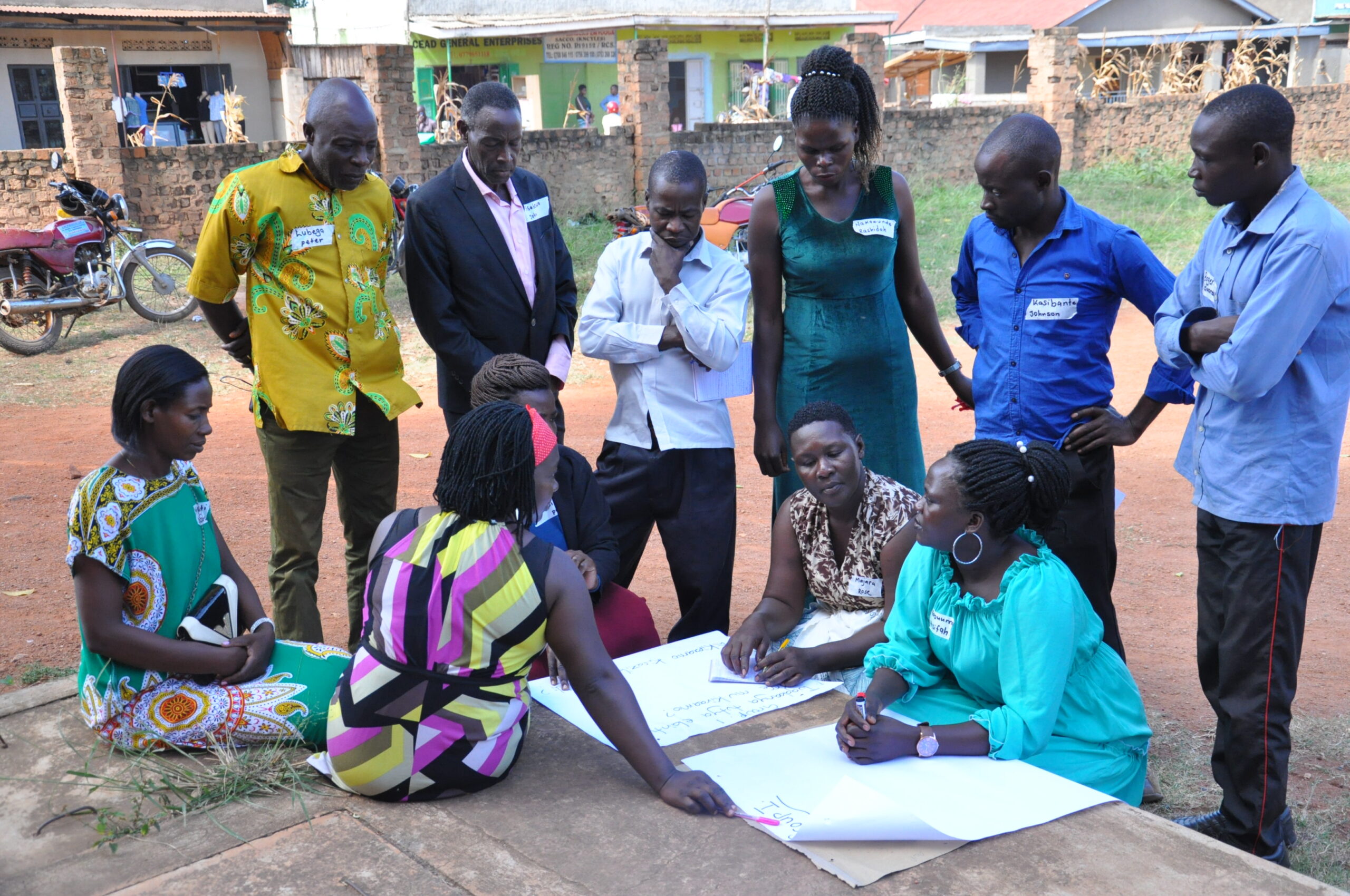 Volunteers during a legal empowerment training plan together how they will facilitate community dialogues in their respective communities.