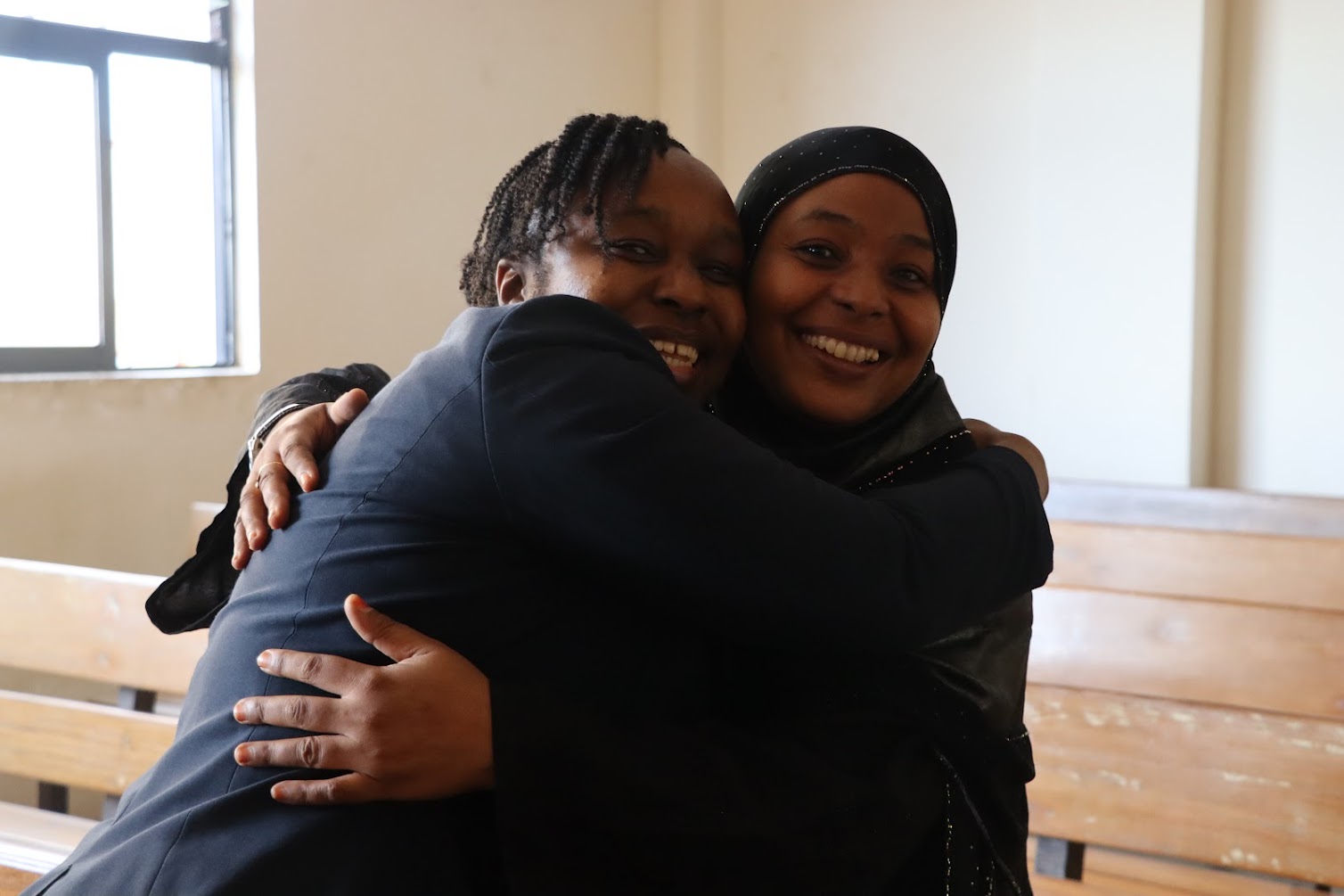Lawyer Emily Kinamain and a community member right after the court hearing